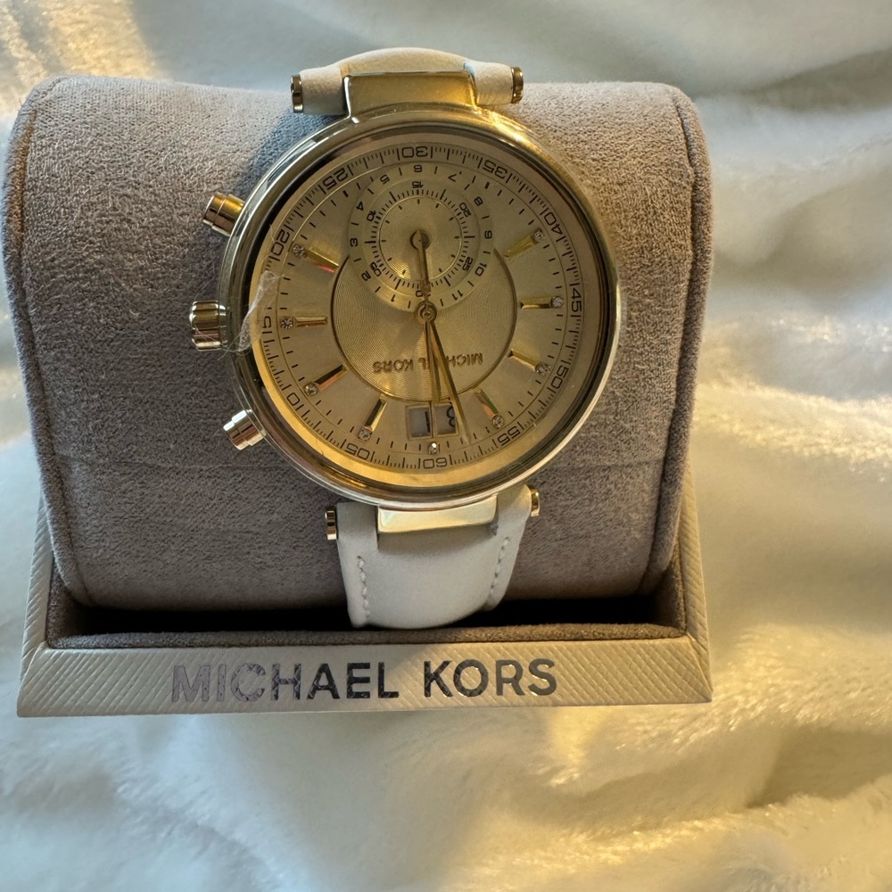 Michael Kors watch white leather band.